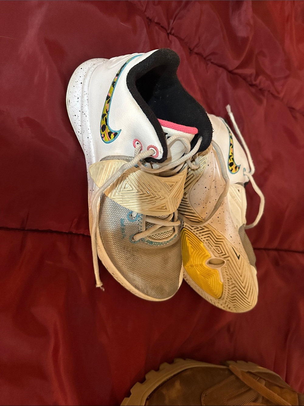 Nike White Sneakers with Multicolor Swoosh and Yellow Accents
